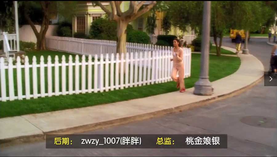 Gabrielle jogs past a fence on the sidewalk.jpg