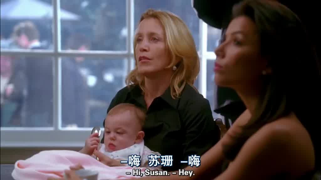 LYNETTE is holding the baby.jpg