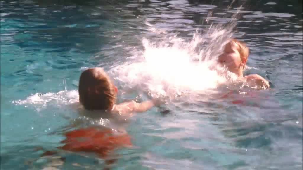 The SCAVO kids are swimming in the pool, splashing, generally making lots of noise.jpg