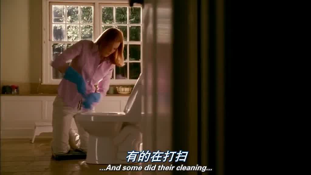 BREE kneels next to the toilet, holding a scrubber, scrubbing the toilet ferociously.jpg