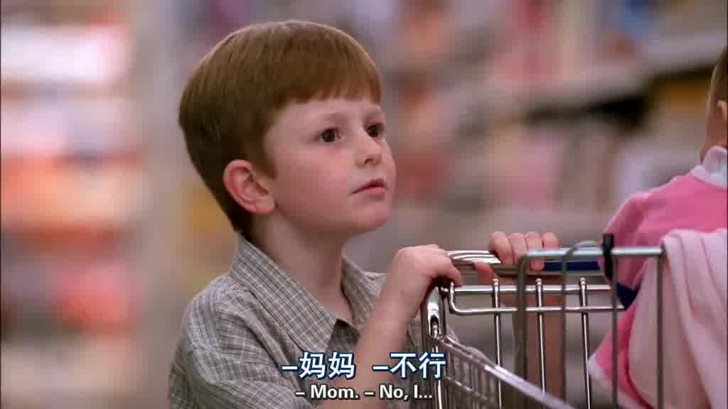 He pushes the cart out of the aisle, looking around, trying to find the twins.jpg