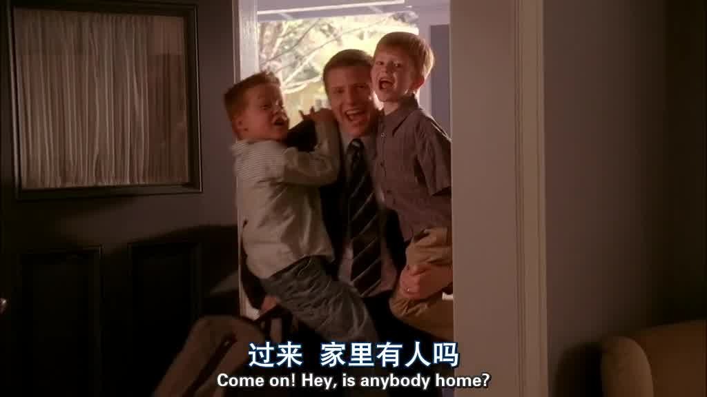 TOM appears at the door, holding a luggage bag, PORTER and PRESTON in his arms.jpg