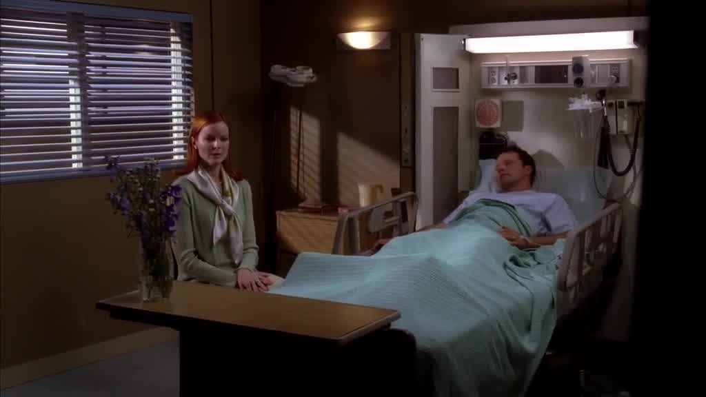 REX is lying in the hospital bed, watching BREE.jpg