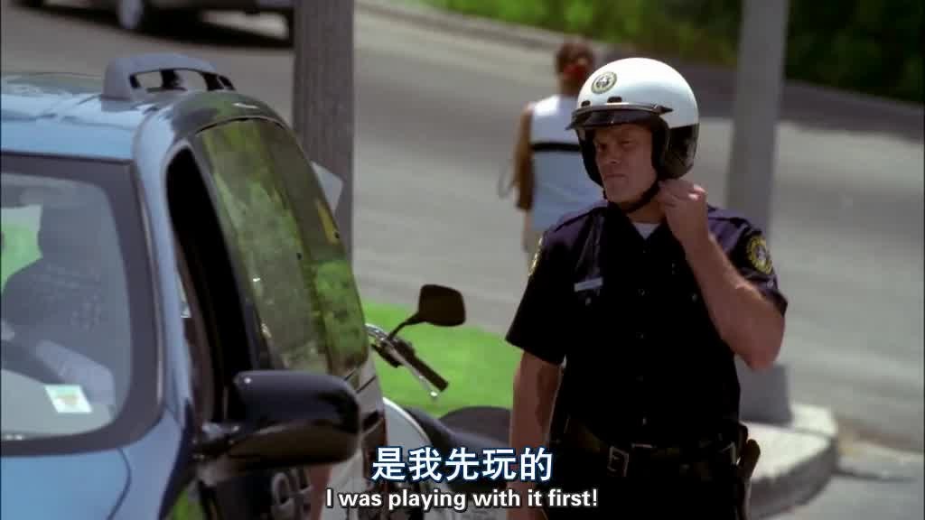 The policeman gets off his bike and walks to LYNETTE's window.jpg