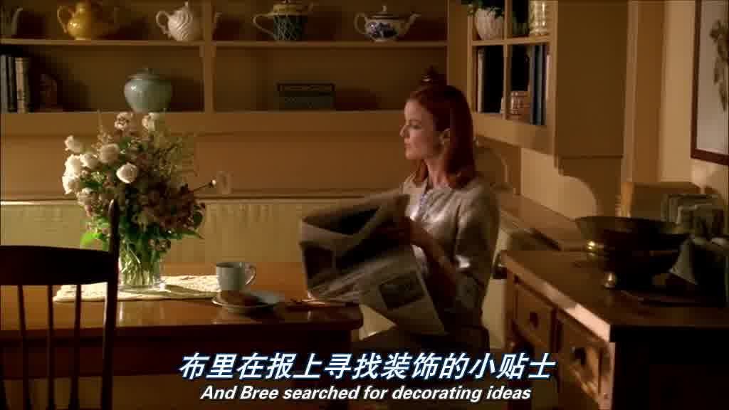 She is engrossed in reading the paper, held by her left hand, the style section.jpg