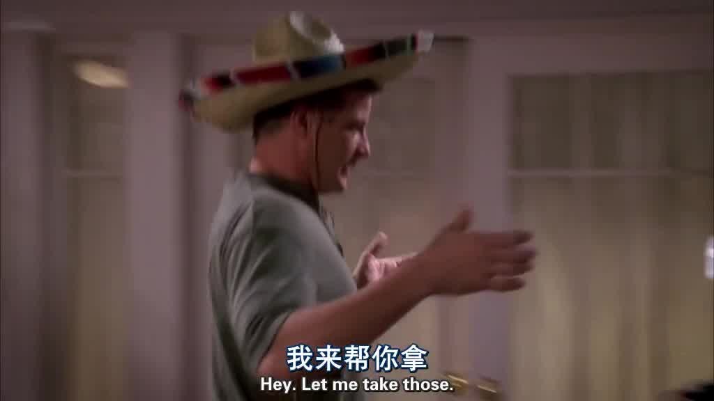 Tom comes down the stairs wearing a sombrero.jpg