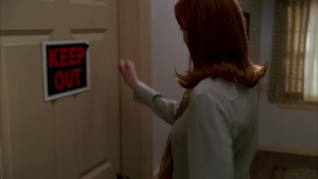 Bree knocks on Andrew's bedroom door.jpg