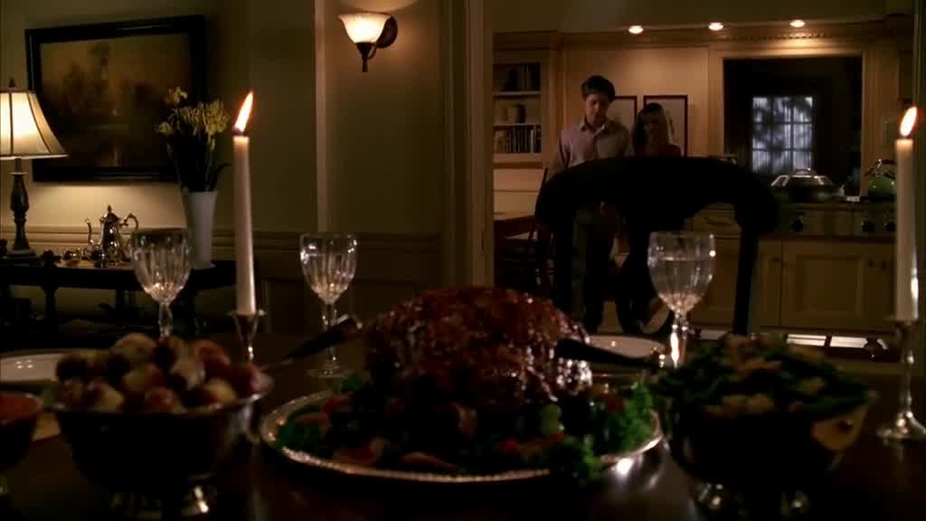 Danielle and Andrew enter the dining room and see the feast laid out for them th.jpg