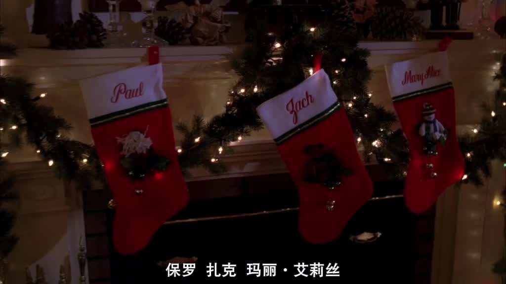 As Bree walks into the room, she sees three stockings hung over the fireplace -t.jpg