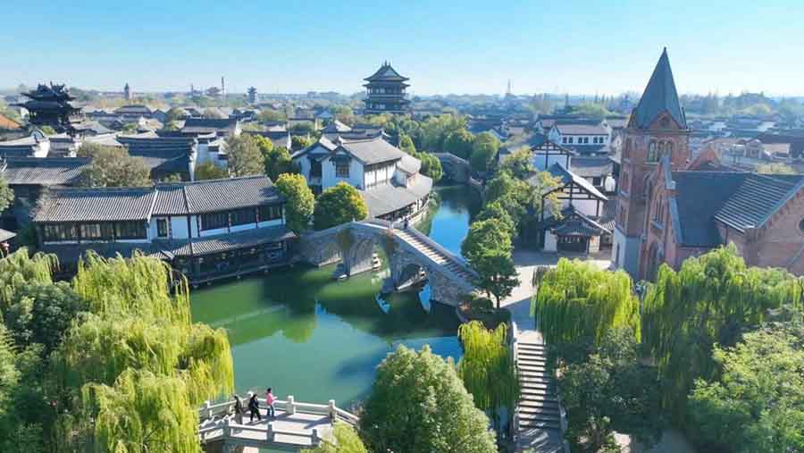 The traditional building along the river in China.jpg