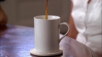 S01E01 The same stream of coffee being poured into a mug