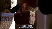 S01E01 PAUL extends his hands to take the baskets from BREE, who moves the baskets out of his reach as he tries to take them from her