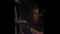 S01E05 He smashes a pane of the back door