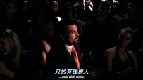 S01E01 The camera pans to CARLOS sitting in the audience