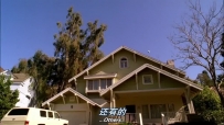 S01E01 A soccer ball is kicked high in the air towards a house