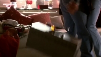 S01E01 She grabs him, as his toolbox drops on the ground with a crash